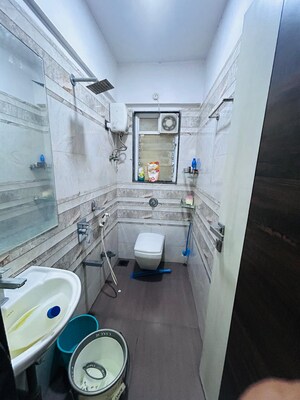 Bathroom in 1 BHK Apartment at Triveni CHS Andheri, Andheri West – for Rent