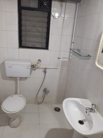 Bathroom in 3 BHK Apartment at Om Avishkar, Rambaug Colony – for Rent