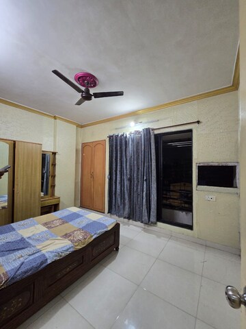 Bedroom in 2 BHK Apartment at Sector 5 Kopar Khairane – for Rent