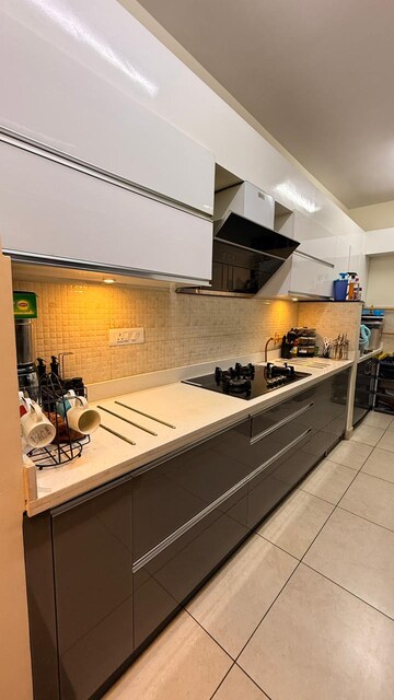 Kitchen in 2 BHK Apartment at Prestige Song Of The South, Yelenahalli – for Sale