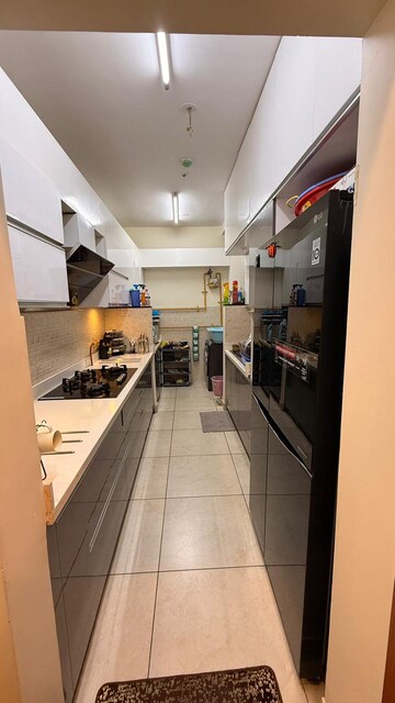Kitchen in 2 BHK Apartment at Prestige Song Of The South, Yelenahalli – for Sale