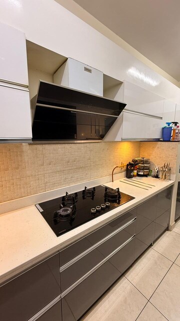 Kitchen in 2 BHK Apartment at Prestige Song Of The South, Yelenahalli – for Sale