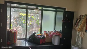 Living Room in 1 BHK Apartment at River Park Complex, Dahisar East – for Rent