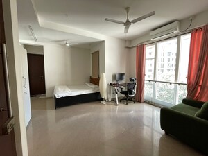 Living Room in 1 BHK Apartment at Godrej Serenity, Chembur – for Rent