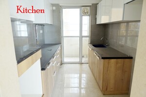 Kitchen in 2 BHK Apartment at Je and Vee Madhuban, Malad East – for Sale