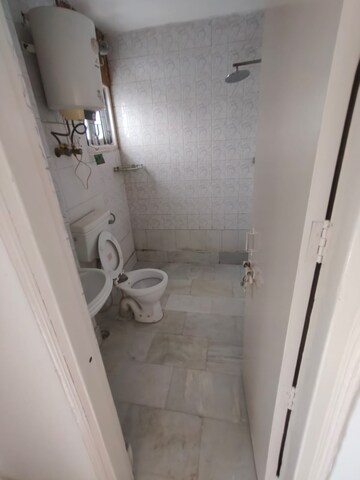 Bathroom in 3 BHK Builder Floor at Auram Floor, South City 2 – for Rent
