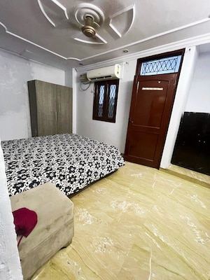 Bedroom in 2 BHK Builder Floor at Lajpat Nagar – for Rent