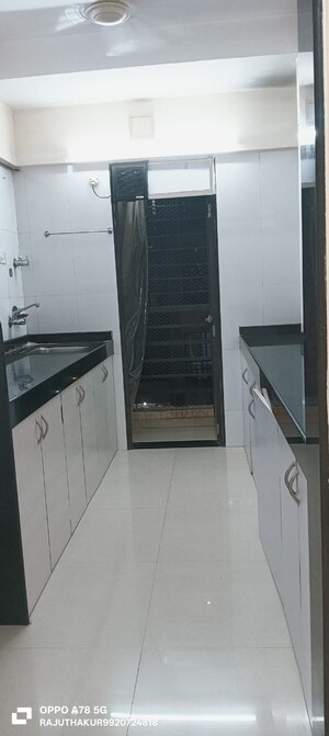 Kitchen in 1 BHK Apartment at Vaibhav Paradise, Santacruz East – for Rent