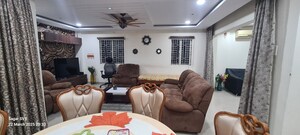 Living Room in 4 BHK Apartment at Modi Mayflower Grande, Mallapur – for Sale