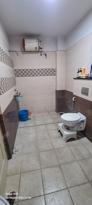 Bathroom in 4 BHK Apartment at Modi Mayflower Grande, Mallapur – for Sale