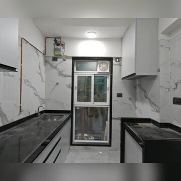 Kitchen in 2 BHK Apartment at Sanghvi Infenia, Santacruz East – for Rent