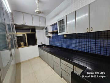 Kitchen in 3 BHK Apartment at Pulkit CHS, Andheri West – for Rent
