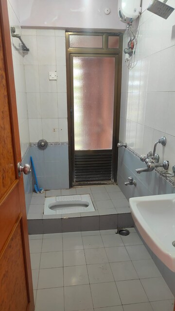 Bathroom in 2 BHK Apartment at Andheri West – for Rent