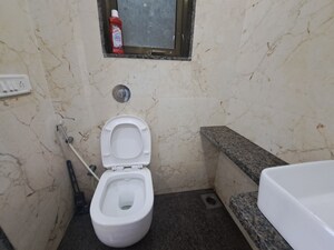 Bathroom in 1 BHK Apartment at Neminath Palace, Santacruz East – for Rent