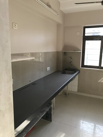 Kitchen in 1 BHK Apartment at Damoji Patil Wadi – for Sale