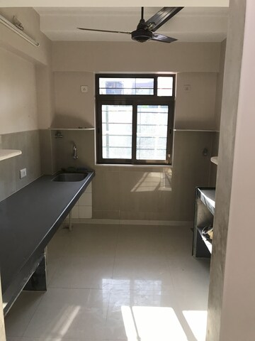 Kitchen in 1 BHK Apartment at Damoji Patil Wadi – for Sale
