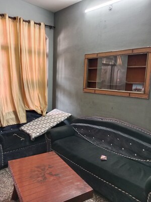 Living Room in 1.5 BHK Builder Floor at Huda – for Rent