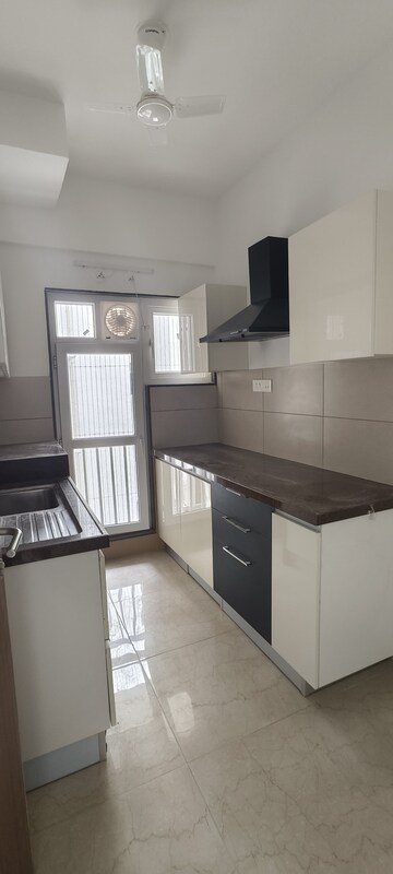 Kitchen in 2 BHK Apartment at Shapoorji Pallonji BKC 28, Bandra East – for Rent