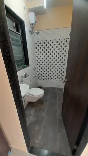 Bathroom in 1 BHK Apartment at UK Iridium, Kandivali East – for Rent
