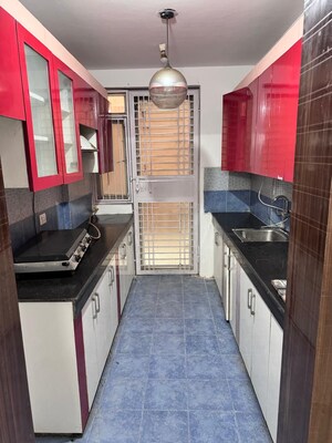 Kitchen in 2 BHK Apartment at Amrapali Heartbeat City, Sector 107 – for Rent