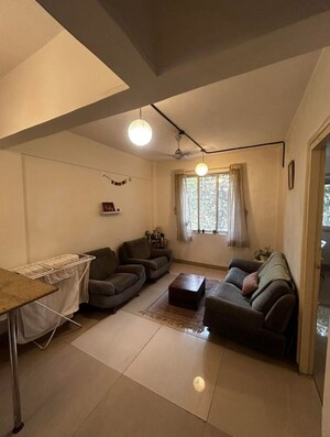 Living Room in 1 BHK Apartment at Hormuzd CHS, Bandra West – for Rent