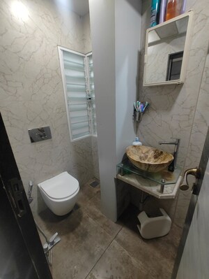 Bathroom in 2 BHK Apartment at Suyog CHS Naupada, Naupada – for Sale