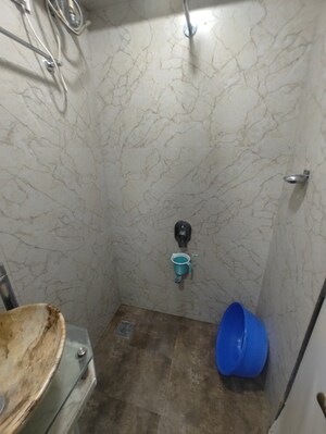 Bathroom in 2 BHK Apartment at Suyog CHS Naupada, Naupada – for Sale