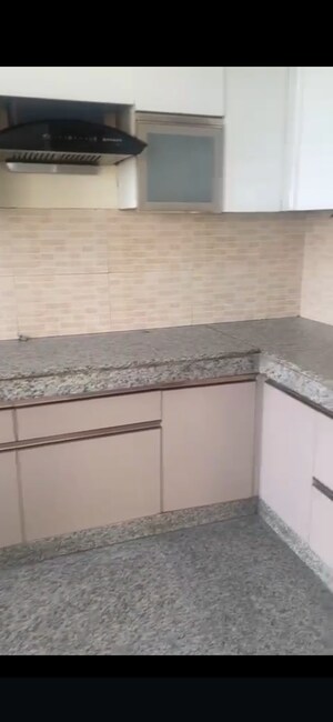 Kitchen in 3 BHK Apartment at Raheja Vedaanta, Sector 108 – for Rent