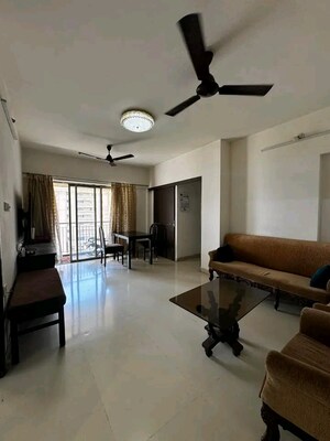 Living Room in 2.5 BHK Apartment at Ghodbunder Road – for Rent