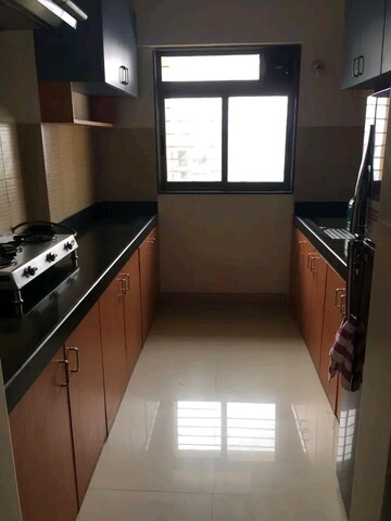 Kitchen in 2.5 BHK Apartment at Lodha Splendora, Ghodbunder Road – for Rent