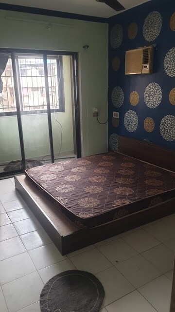 Living Room in 2 BHK Apartment at Om Harmony, Sector 11 Kopar Khairane – for Rent