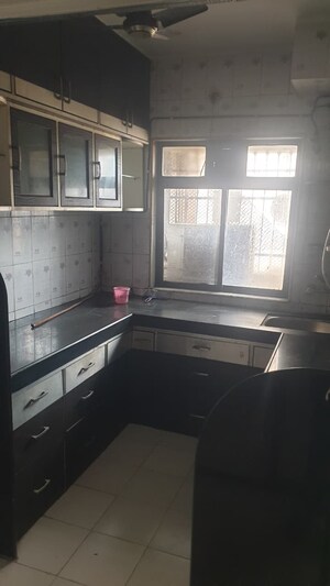 Kitchen in 2 BHK Apartment at Om Harmony, Sector 11 Kopar Khairane – for Rent