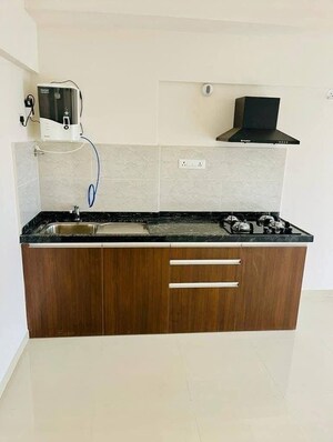 Kitchen in Studio Apartment at Gera World of Joy, Kharadi – for Rent