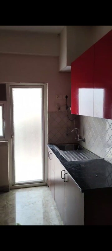 Kitchen in 3 BHK Apartment at Amrapali Terrace Homes, Tech Zone 4 Greater Noida – for Rent
