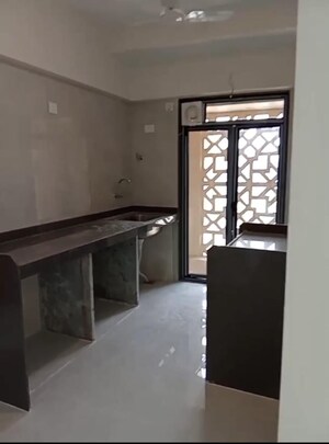 Kitchen in 2 BHK Apartment at Modirealty Wisteria, Kandivali West – for Rent