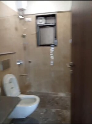 Bathroom in 2 BHK Apartment at Modirealty Wisteria, Kandivali West – for Rent