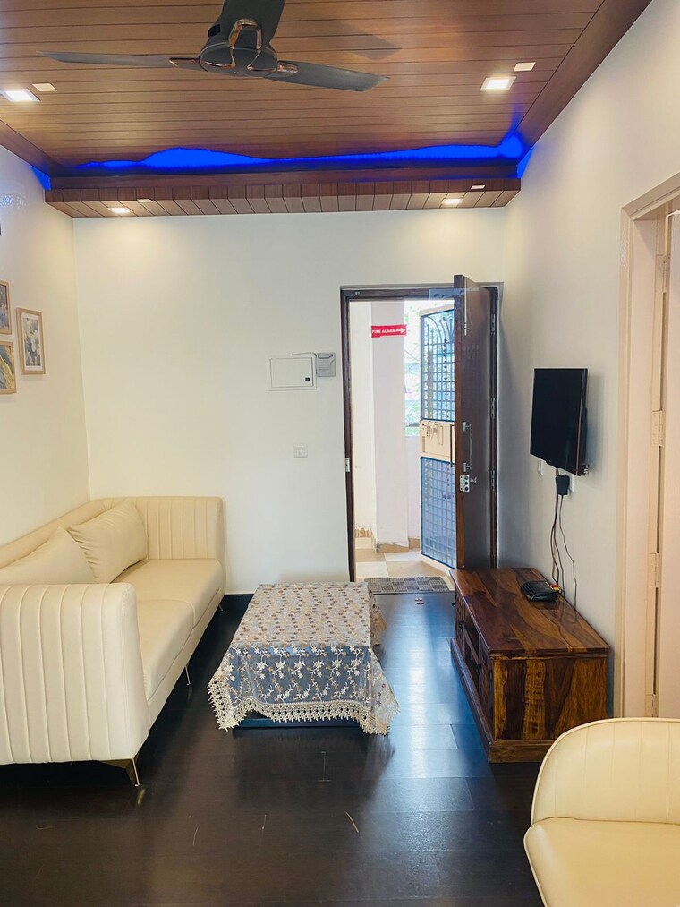 Living Room, aditya-celebrity-homes 1 Bedroom 550 Sq.Ft. Apartment In Sector 76 Noida 9322936