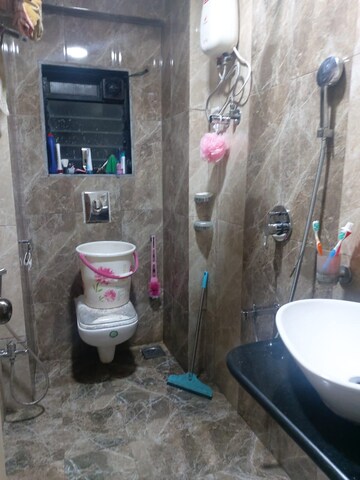 Bathroom in 2 BHK Apartment at RNA Royale Park, Kandivali West – for Rent
