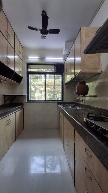 Kitchen in 2 BHK Apartment at Sheth Vasant Marvel, Borivali East – for Rent