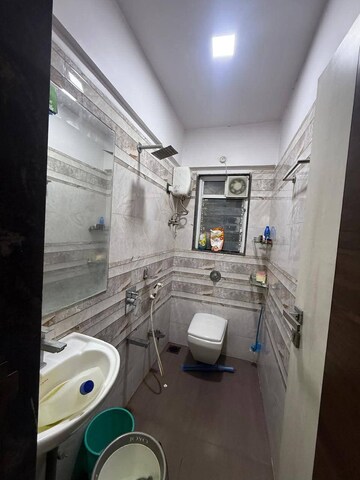 Bathroom in 1 BHK Apartment at Azad Nagar Sangam CHS Andheri, Andheri West – for Rent