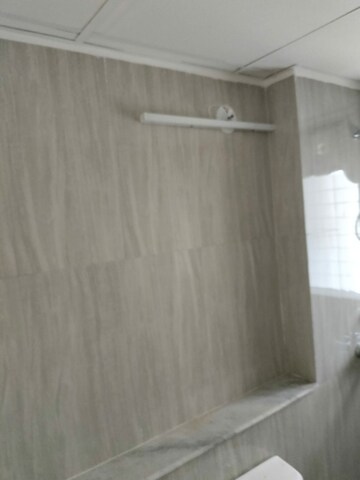 Bathroom in 1 BHK Apartment at Runwal Gardens, Dombivli East – for Rent