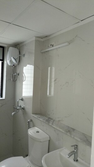 Bathroom in 1 BHK Apartment at Runwal Gardens, Dombivli East – for Rent