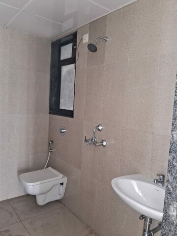Bathroom in 1 BHK Apartment at Runwal Gardens, Dombivli East – for Rent