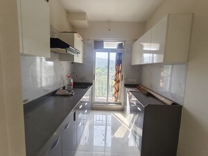 Kitchen in 1 BHK Apartment at Vihang Vermont, Ghodbunder Road – for Rent