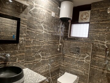 Bathroom in 4 BHK Builder Floor at Ansal Sushant Lok I, Sector 43 – for Sale
