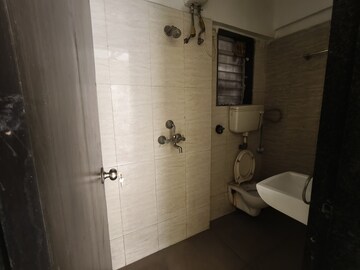 Bathroom in 1 BHK Apartment at Rosa Classique, Kasarvadavali – for Rent