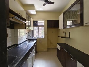 Kitchen in 1 BHK Apartment at Rosa Classique, Kasarvadavali – for Rent
