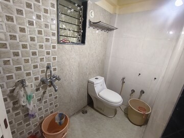 Bathroom in 2 BHK Apartment at Bhakti Pearl, Kasarvadavali – for Rent