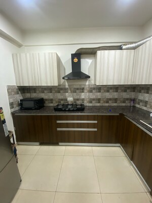 Kitchen in 3 BHK Apartment at Sushma Chandigarh Grande, Ghazipur – for Rent