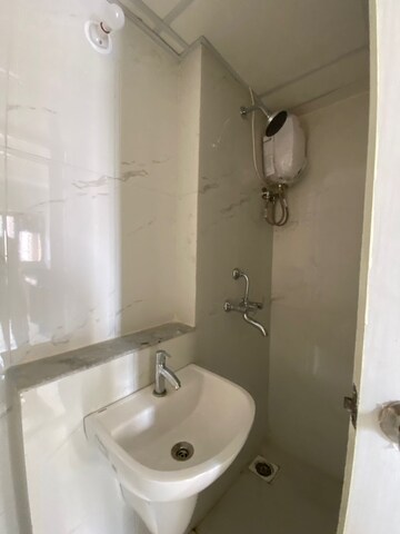 Bathroom in 1.5 BHK Apartment at Runwal Gardens, Dombivli East – for Rent